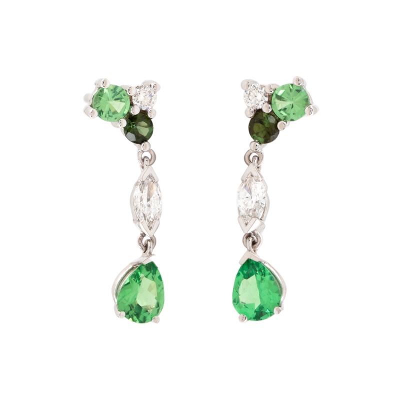 Long rose gold earrings with green gemstones, jewelry trend for 2026