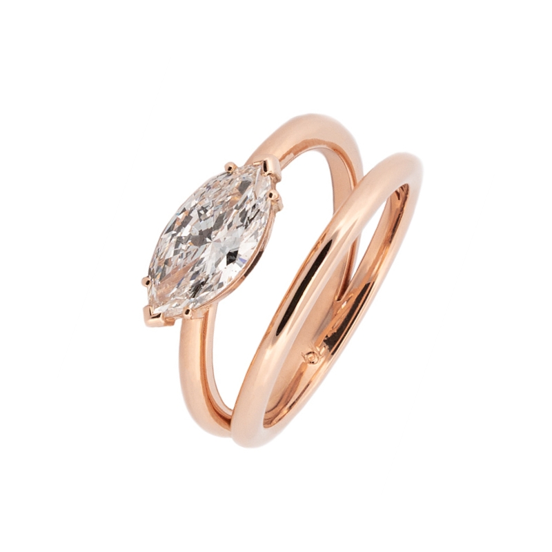 Double ring in rose gold with a diamond, fine jewelry to give as a Christmas gift